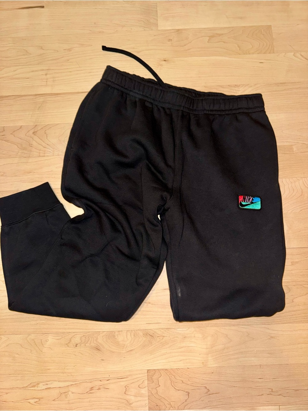 Nike Black Jogger Sweatpants with Multicolor Logo Patch